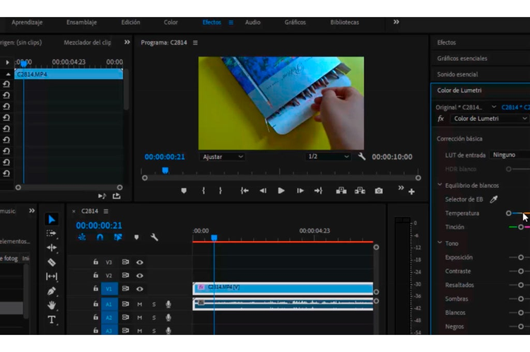 Interfaz adobe premiere pro seleccionado color lumettri para la creacion de colores y efectos dentro de la interfaz de edicion un video de una persona manipulando una caja de colores