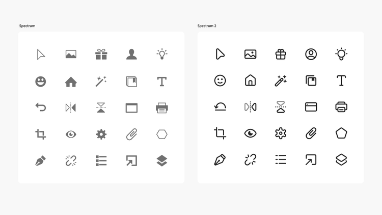 Side-by-side composite. First, the current Spectrum icons. Next, the new Spectrum 2 icons. Both including arrow, image, lightbulb, smiley face, and a paperclip, among others. The new Spectrum 2 icons have more contrast, thicker strokes, and rounded edges than the current Spectrum icons.