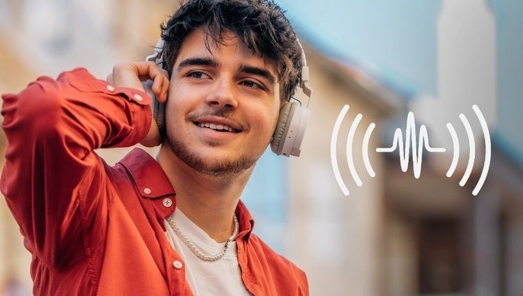 A person wearing headphones Description automatically generated
