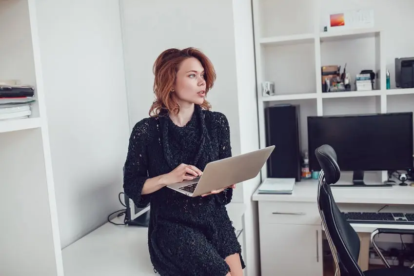 the young business woman with a computer in the office