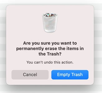 ゴミ箱をからにしようとするユーザーに表示される macOS のダイアログ。ユーザーにこの操作がやり直せないことを知らせる。
