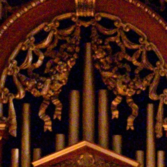 A picture containing furniture, altar, close Description automatically generated