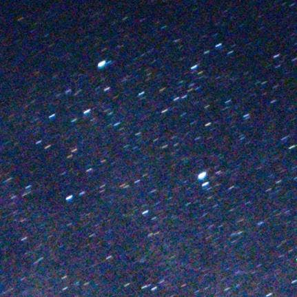 A picture containing outdoor object, star, night sky Description automatically generated
