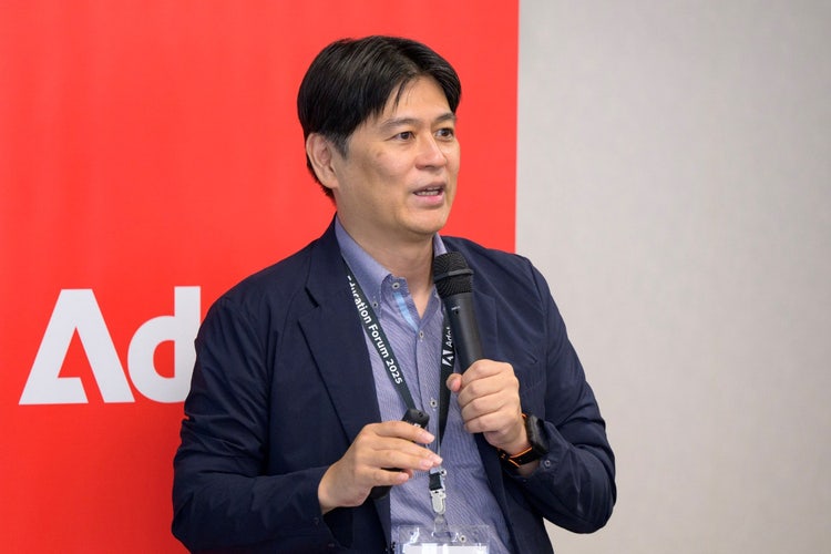 A person holding a microphone AI-generated content may be incorrect.