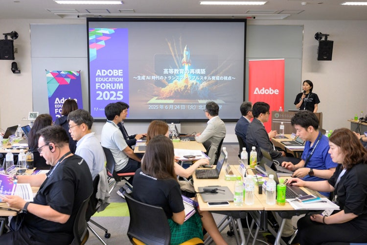 A group of people sitting at tables in a room with a projector screen AI-generated content may be incorrect.