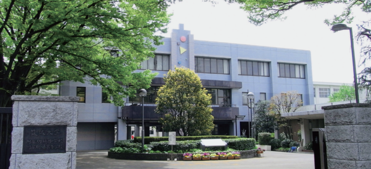 A building with trees around it AI-generated content may be incorrect.