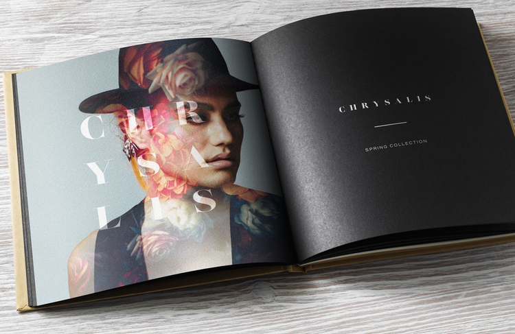 The book mockup layout has model image blended on the left page and the words ‘Chrysalis Spring Collection’ on the right